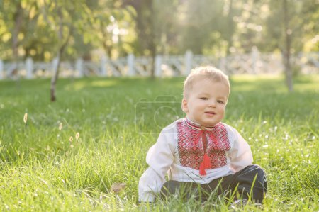 Photo for Toddler boy in Ukrainian vyshyvanka in summer. - Royalty Free Image