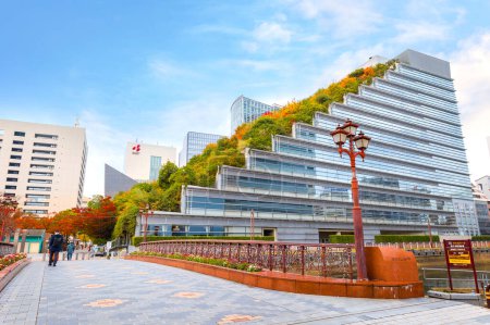 Photo for Fukuoka, Japan - Nov 21 2022: ACROS Fukuoka is a conventional office building with a huge terraced of a park. The garden reaches 60 meters above the ground - Royalty Free Image