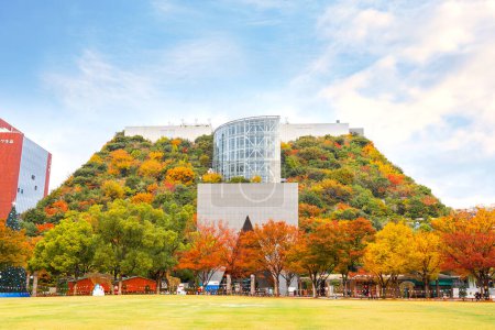 Photo for Fukuoka, Japan - Nov 21 2022: ACROS Fukuoka is a conventional office building with a huge terraced of a park. The garden reaches 60 meters above the ground - Royalty Free Image