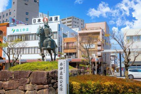 Photo for Ii Naomasa was a general under the Sengoku period, regarded as one of the Four Guardians of the Tokugawa, his statue located in front of Hikone station  in Shiga, Japan - Royalty Free Image