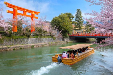 Photo for Kyoto, Japan - April 2 2023: Okazaki Jikkokubune Boat Ride runs a three kilometers cruise from Nanzenji boat pier to Ebisu Dam and back round trip - Royalty Free Image