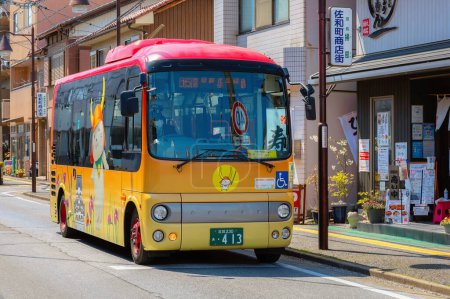 Photo for Shiga, Japan - April 3 2023: A Hikone Castle loop bus operated for tourist between hikone train station and Hikone Castle - Royalty Free Image