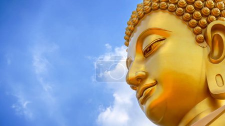 Bangkok, Thailand - December 20 2023:The Big Seated Buddha Statue (Buddha Dhammakaya Dhepmongkol) at Wat Paknam Phasi Charoen (temple) in Bangkok, Thailand