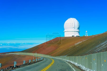 Photo for View of the observatory dome at the summit of Mauna Kea volcano from the entrance road. - Royalty Free Image