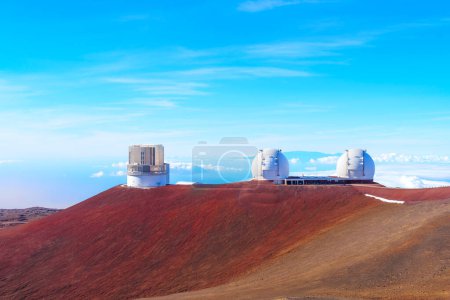 Photo for Group of astronomical research units set in a Martian landscape of the Mauna Kea summit in Hawaii. - Royalty Free Image