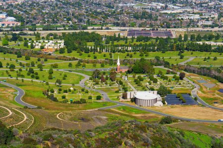Photo for Captivating view from the Hollywood Hills offering an aerial sight of the serene Forest Lawn Memorial Park. - Royalty Free Image