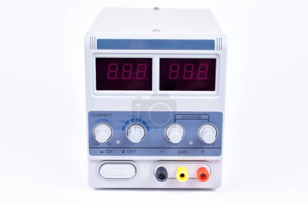 Close-up of a direct current power supply unit isolated on white background.
