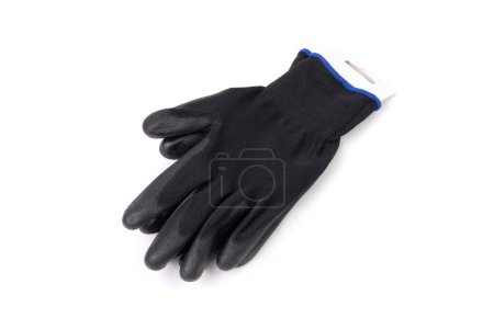Primer plano de un par de guantes de trabajo negros con un revestimiento de poliuretano aislado en blanco. Concepto de equipo de seguridad.