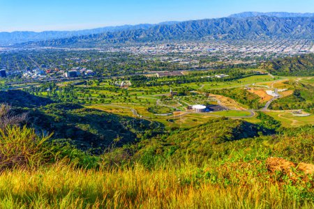 Gaze upon the serene expanse of Forest Lawn Memorial Park from this peaceful hillside vantage point.