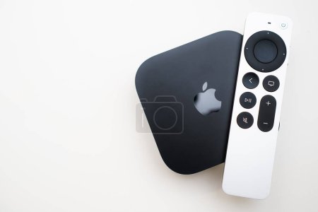 Téléchargez les photos : Apple TV 4k and remote controller on the white background, February 2023, Prague, Czech Republic - en image libre de droit