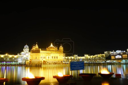 Photo for Celebration of Gurupurab in Golden Temple Amritsar and Diwali Fireworks - Royalty Free Image