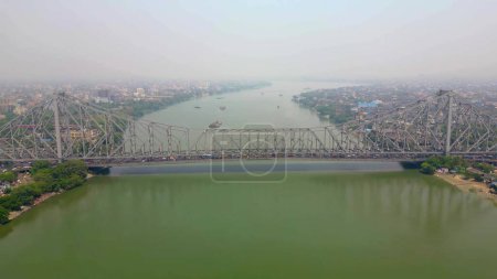 Photo for Aerial view of Howrah Bridge, This is a balanced steel bridge over the Hooghly River in West Bengal, India. - Royalty Free Image