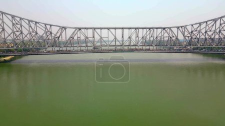 Aerial view of Howrah Bridge, This is a balanced steel bridge over the Hooghly River in West Bengal, India.