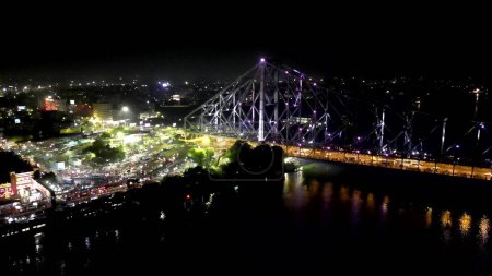 Aerial view of Howrah Bridge, This is a balanced steel bridge over the Hooghly River in West Bengal, India.
