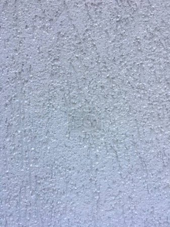 Texture of an old white plaster