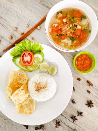 Photo for Seafood Soup, Gurami Fish with Rice - Royalty Free Image