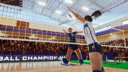 Photo for Female volleyball players in action on professional stadium. - Royalty Free Image