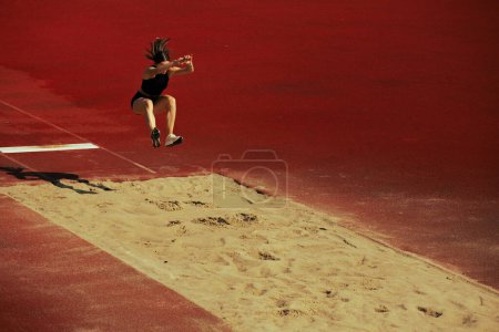 Photo for Athlete girl training on running track. - Royalty Free Image