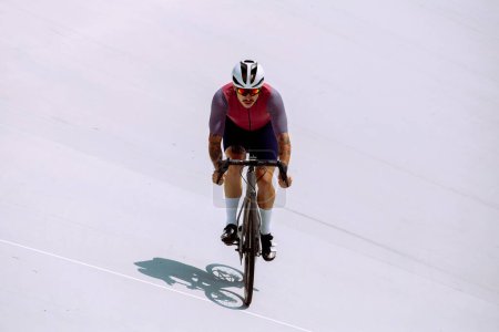 Photo for Cyclist training on the cycle track - Royalty Free Image