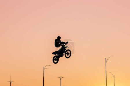 Photo for FMX rider performing a dangerous trick - Royalty Free Image