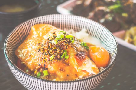 Photo for Aburi Grilled Salmon Rice  Bowl Spicy Miso Sauce with onsen half boiled egg - Royalty Free Image