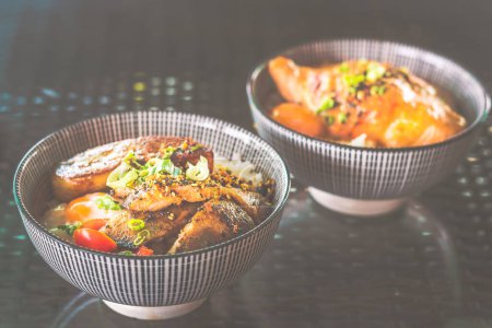 Photo for Grilled Pork Cheek and Foie Gras rice Bowl with onsen soft boil egg - Royalty Free Image