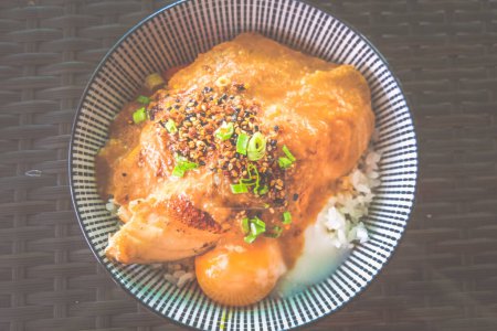 Photo for Aburi Grilled Salmon Rice  Bowl Spicy Miso Sauce with onsen half boiled egg - Royalty Free Image