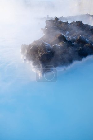 Photo for Blue Lagoon, Iceland. Natural background. Geothermal spa for rest and relaxation in Iceland. Warm springs of natural origin. Blue lake and steam. - Royalty Free Image