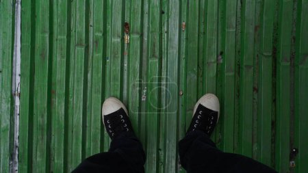 Photo for Photo from above of black and white shoes standing on the floor - Royalty Free Image