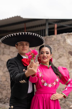 Photo for Young hispanic woman and man in independence day or cinco de mayo parade or cultural Festival - Royalty Free Image