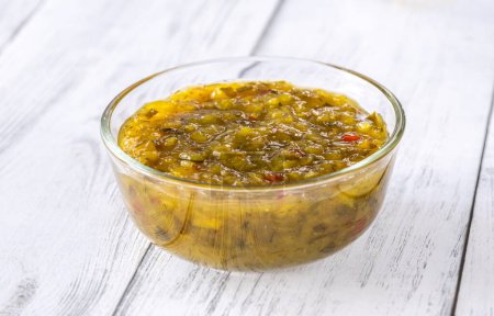 Pickled cucumber relish in the glass bowl