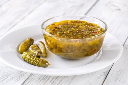 Pickled cucumber relish in the glass bowl
