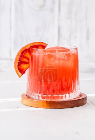 Sanguinello Cocktail garnished with blood orange wheel