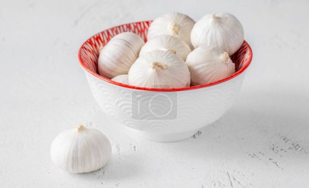 Bunch of solo garlic on the white background
