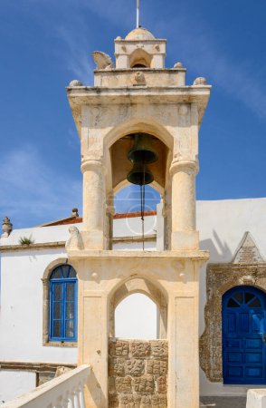 Porta, the central square of Nikia village with the impressive church. Nisyros island, Greece