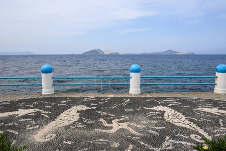 Promenade with traditional Greek mosaic on Nisyros island. Greece