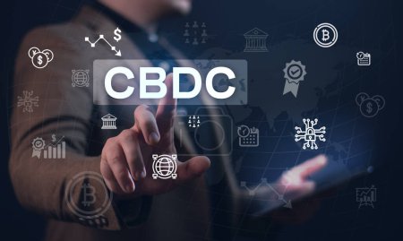 The concept of the digital currency of the Central Bank CBDC. The businessman clicks on a digital hologram with a CBDC concept presentation. Digital currency. Blockchain