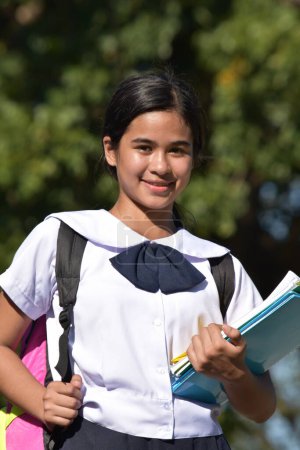 Téléchargez les photos : Serious Student Teenager School Girl Wearing Uniform With Backpack - en image libre de droit