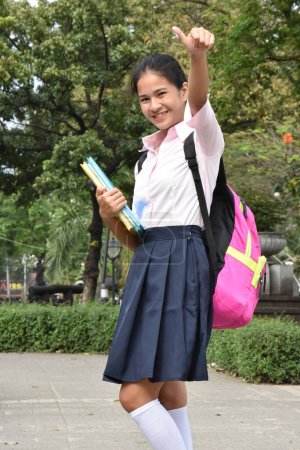 Téléchargez les photos : Successful Student Teenager School Girl Wearing Backpack With Books - en image libre de droit
