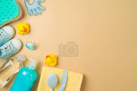 Photo for Baby bath and children health care products on modern background. Infant shampoo, duck toys and towel. Top view, flat lay - Royalty Free Image