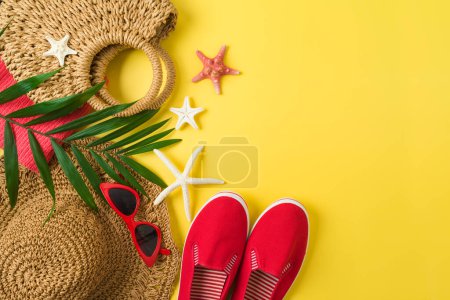 Photo for Summer holiday vacation background with straw hat, bag and beach accessories. Top view from above - Royalty Free Image