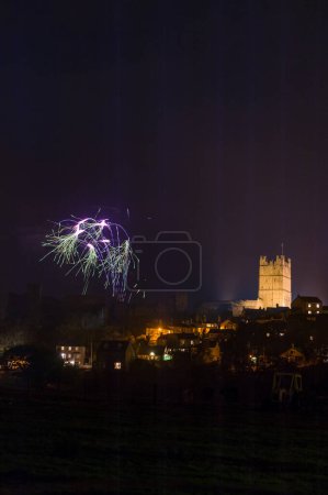 Photo for Fireworks display above houses and Richmond Castle, North Yorkshire - Royalty Free Image