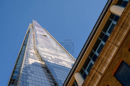 Photo for LONDON - November 4, 2020: View up The Shard with the corner of Guys Hospital in the foreground - Royalty Free Image