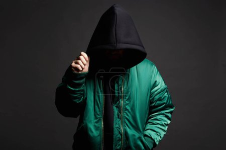 Photo for Stylish Man. Person in Black Hood. Boy in a hooded sweatshirt - Royalty Free Image