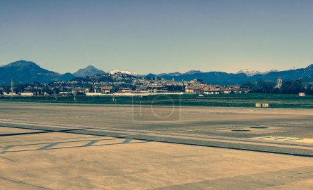 Photo for Airport of Treviso with mountaisn in the background - Royalty Free Image