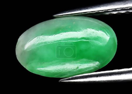 Photo for Natural gem green jade on gray background - Royalty Free Image