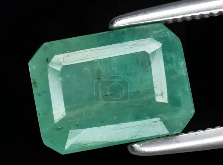 Photo for Natural green dioptase gem on the background - Royalty Free Image