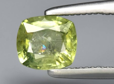 Photo for Natural light green sapphire gem on background - Royalty Free Image