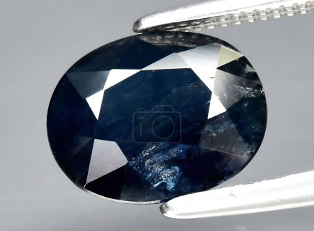 natural blue sapphire gem on background