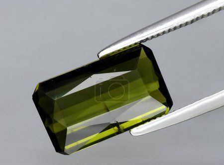 Photo for Natural green tourmaline gem on background - Royalty Free Image